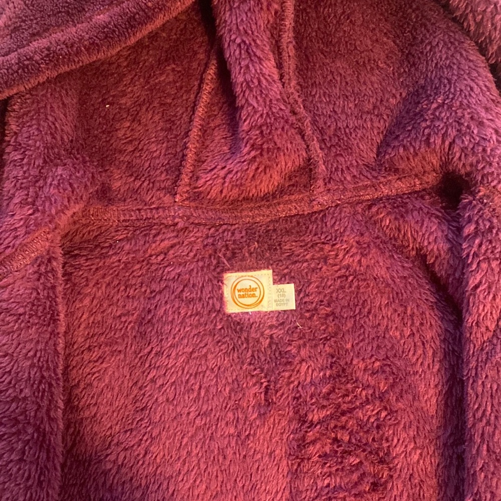 Girls size XXL (18) thick jacket. It’s a deep purple color.